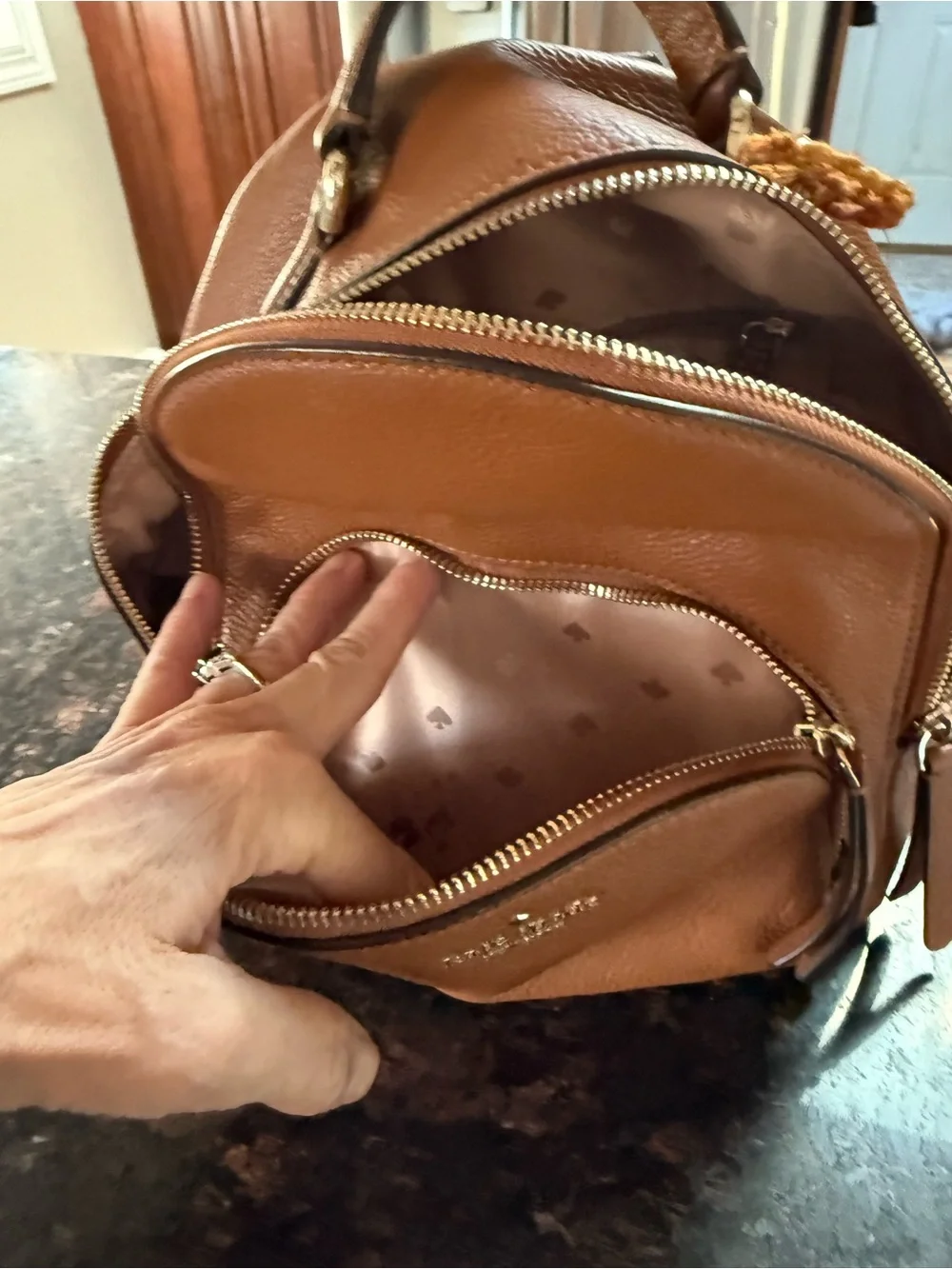 kate spade Brown Pebbled Leather Mini Backpack